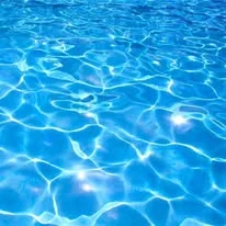 Ripples in blue pool water